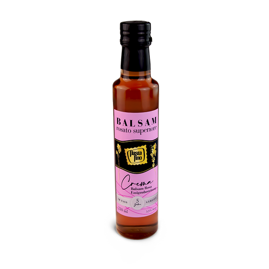 Flasche Balsamico-Creme auf weißem Hintergrund.