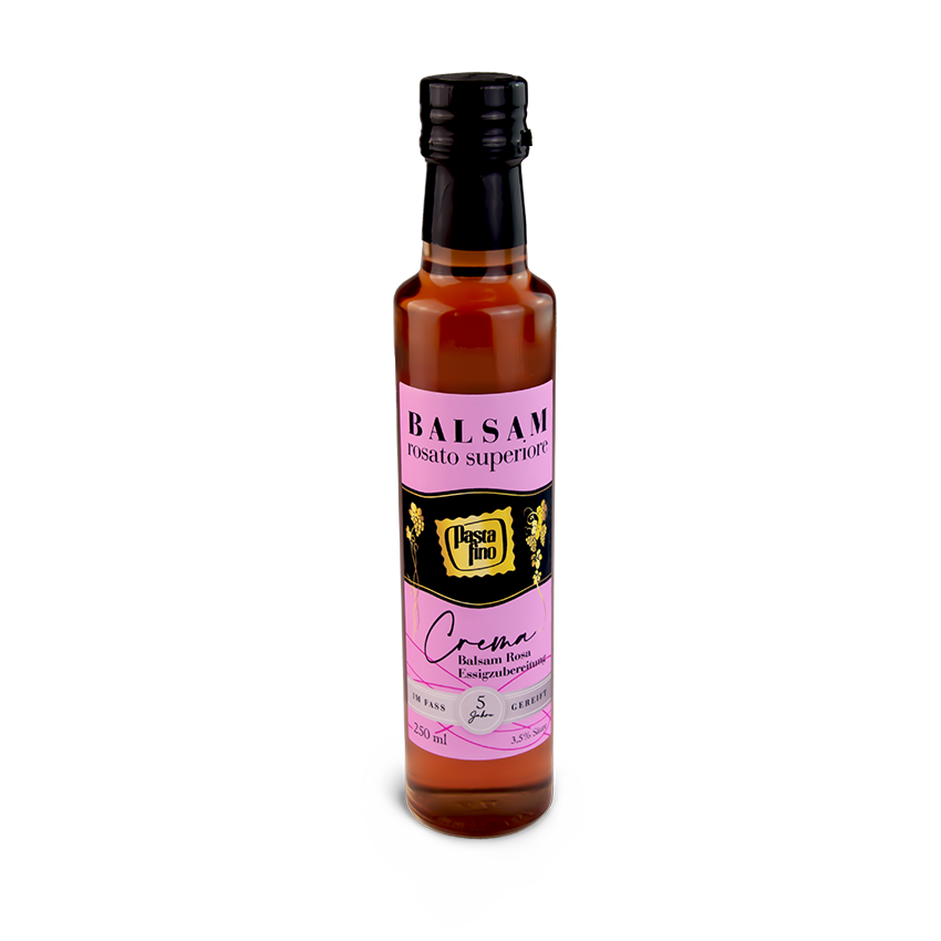 Flasche Balsamico-Creme auf weißem Hintergrund.